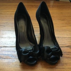 Black satin Coach heels